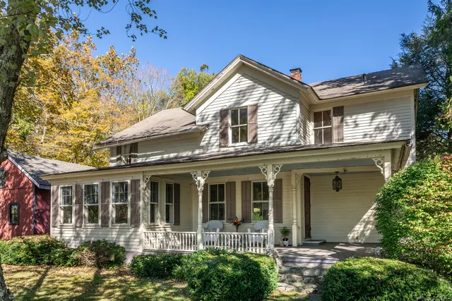 front view of a house with a small yard