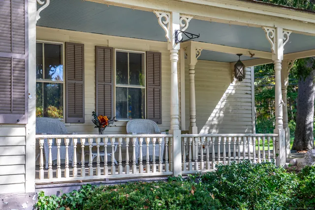 a view of a house with a porch