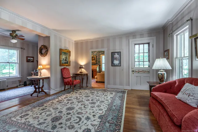 a living room with furniture and a window