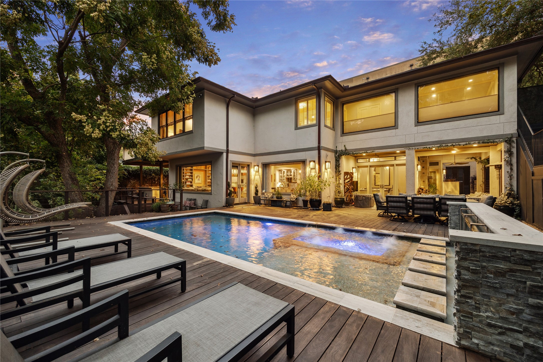 a view of a patio with swimming pool table and chairs