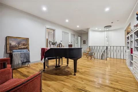 a kitchen with a refrigerator and cabinets