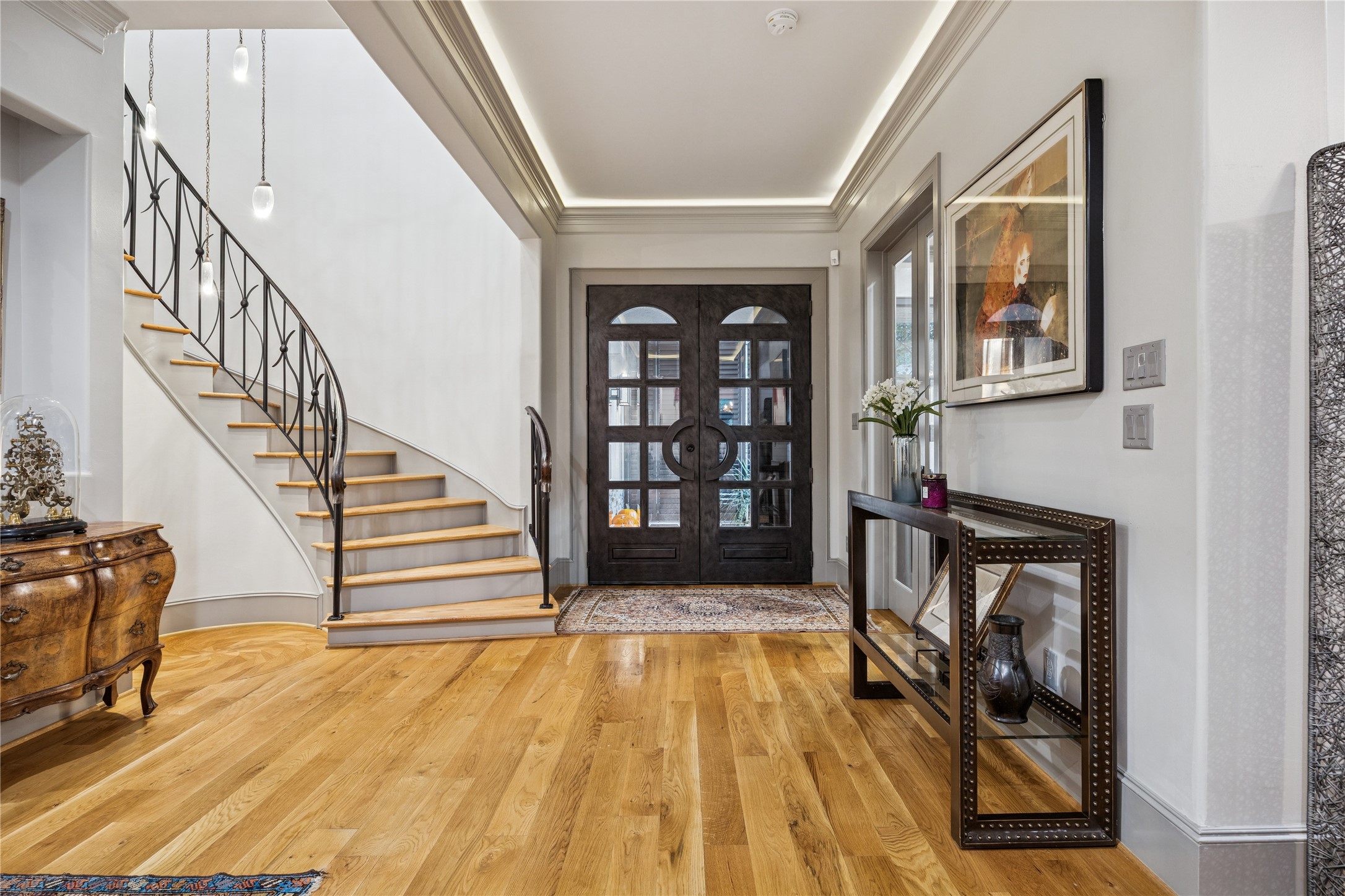 420 Pinewold Drive Houston, TX 77056 - Photo 4 of 41 a view of an entryway with wooden floor and a front door