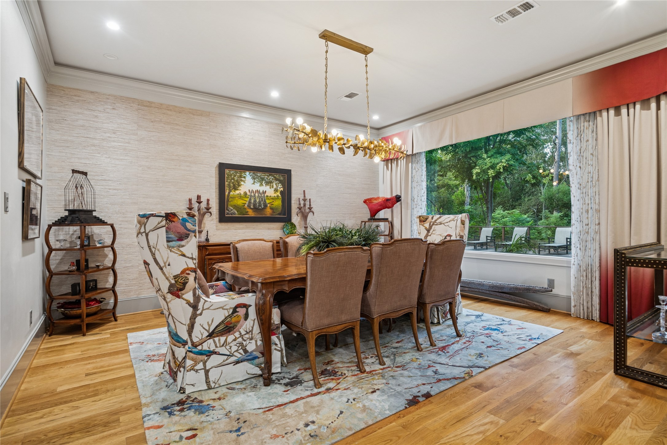 420 Pinewold Drive Houston, TX 77056 - Photo 6 of 41 a dining room with furniture a chandelier and wooden floor