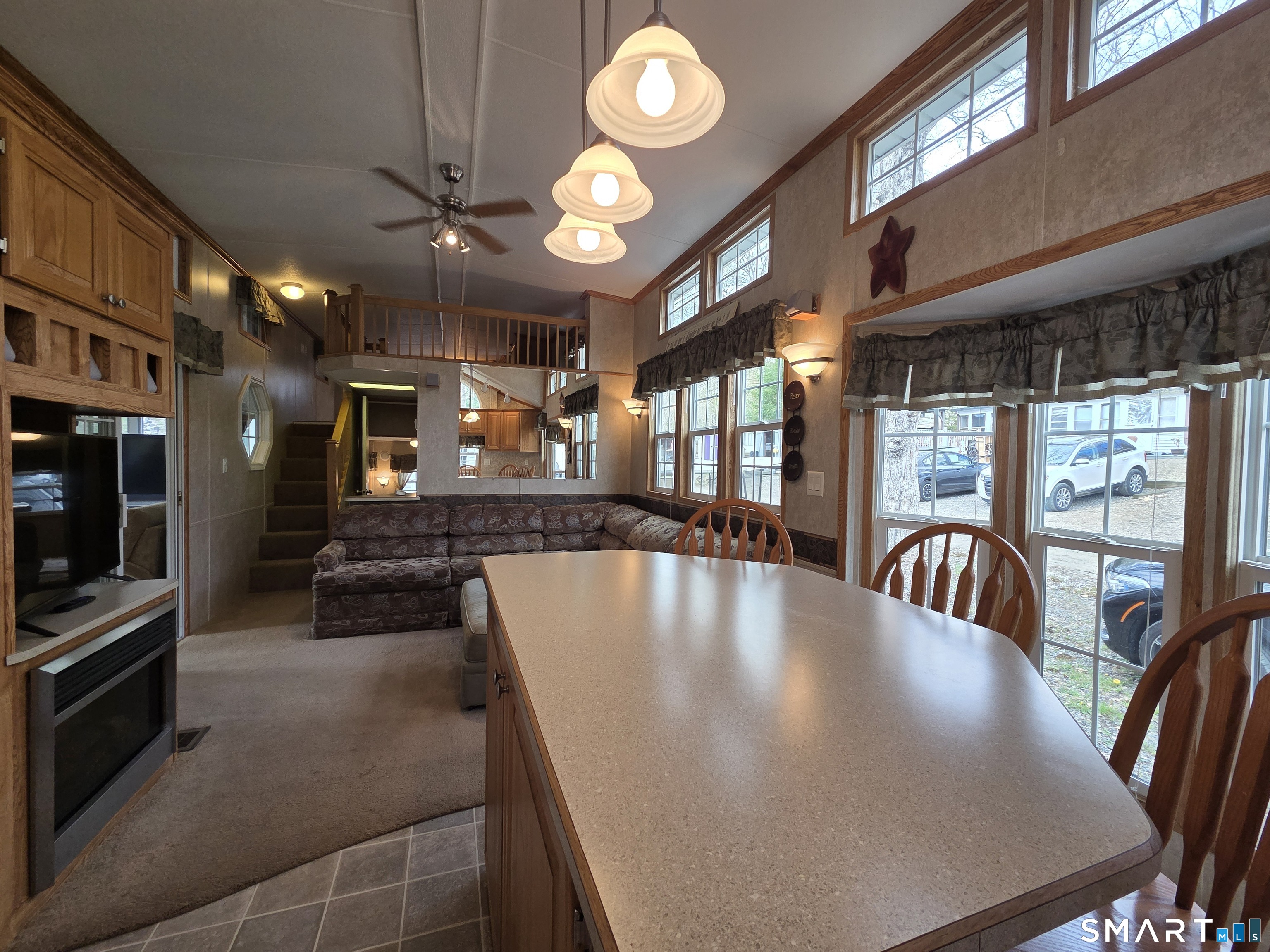 8 S Road, Unit WW108 Stafford, CT 06076 - Photo 5 of 18 a view of a dining room with furniture
