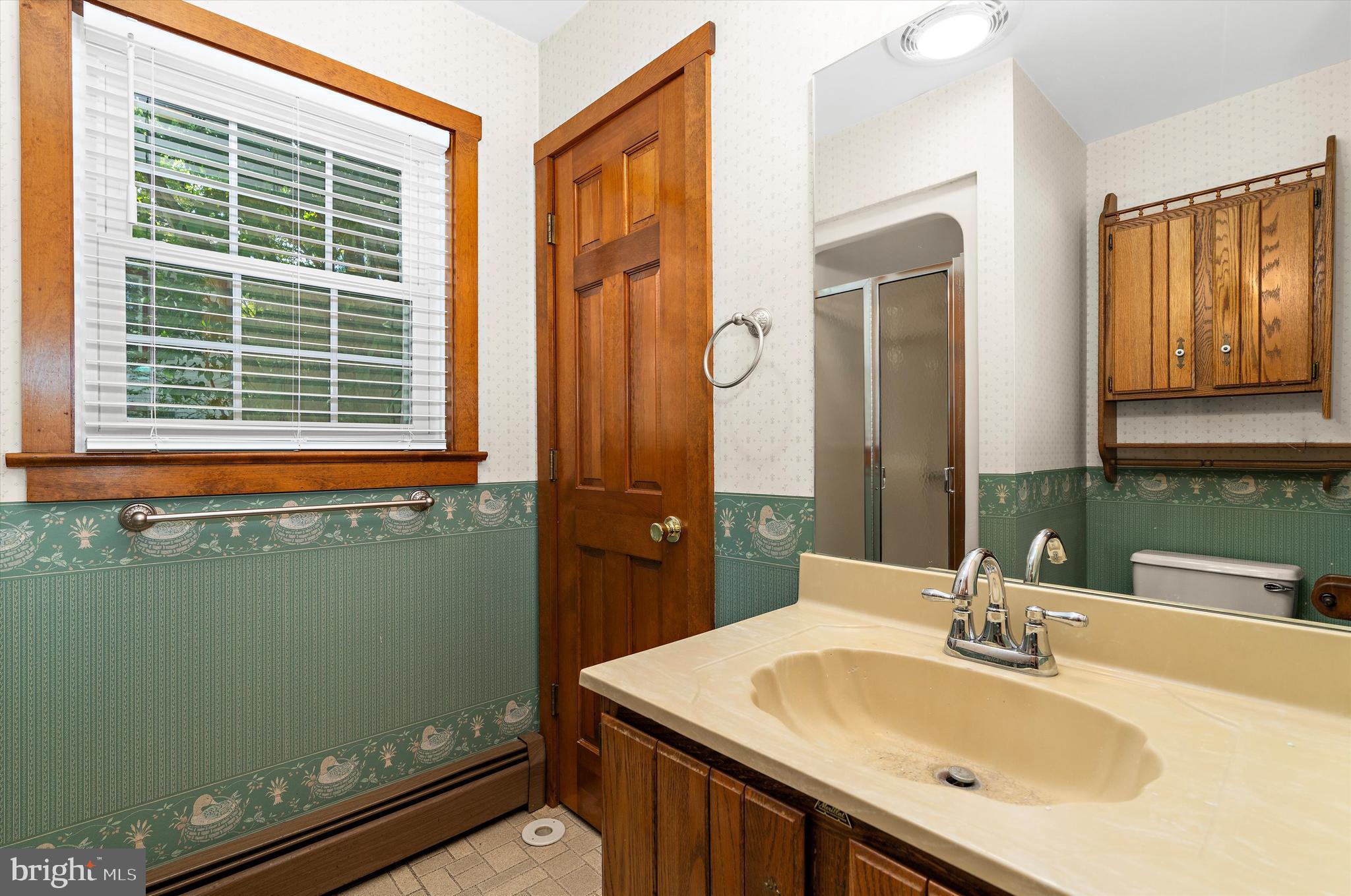 12714 Still Pond Road Still Pond, MD 21667 - Photo 12 of 62 a bathroom with a sink and a mirror
