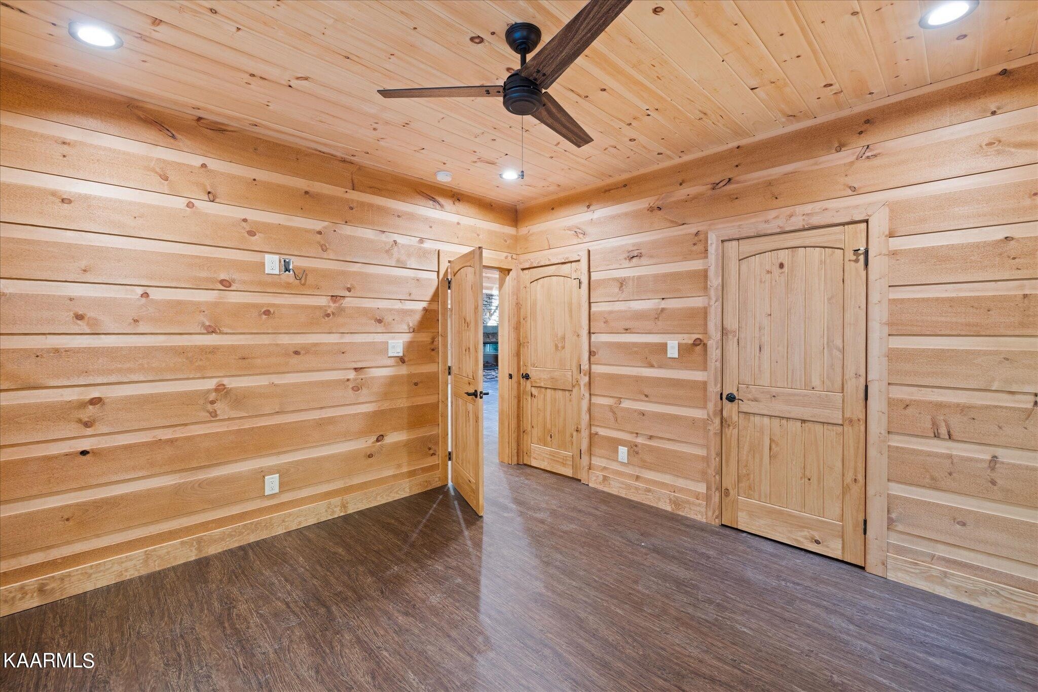 4228 Wears Valley Road, Unit 71 Sevierville, TN 37862 - Photo 13 of 28 a view of an empty room with wooden floor
