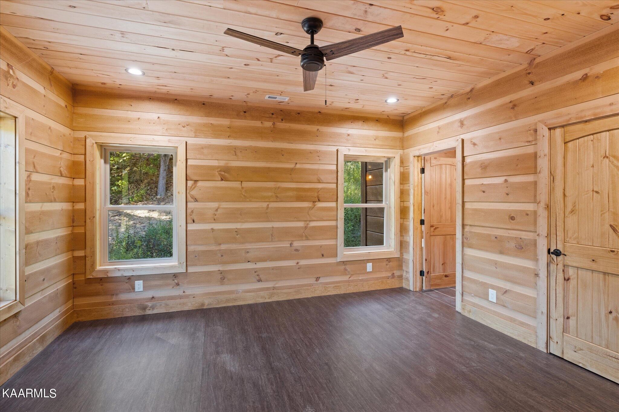 4228 Wears Valley Road, Unit 71 Sevierville, TN 37862 - Photo 16 of 28 a view of empty room with wooden floor and fan
