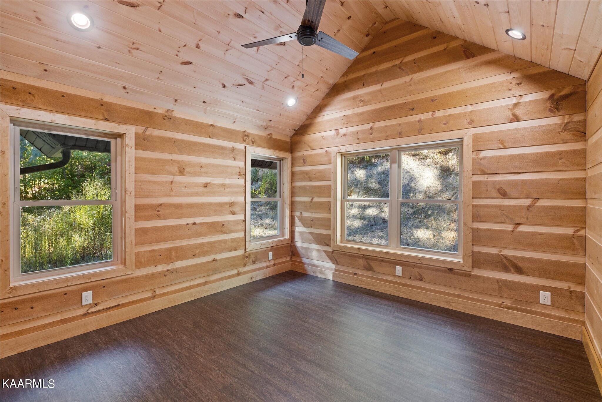 4228 Wears Valley Road, Unit 71 Sevierville, TN 37862 - Photo 23 of 28 a view of empty room with wooden floor and window