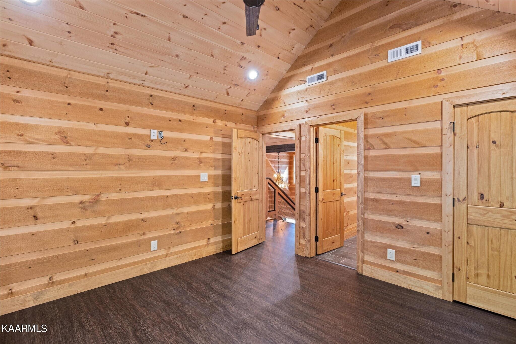 4228 Wears Valley Road, Unit 71 Sevierville, TN 37862 - Photo 24 of 28 a view of walk in closet with wooden floor