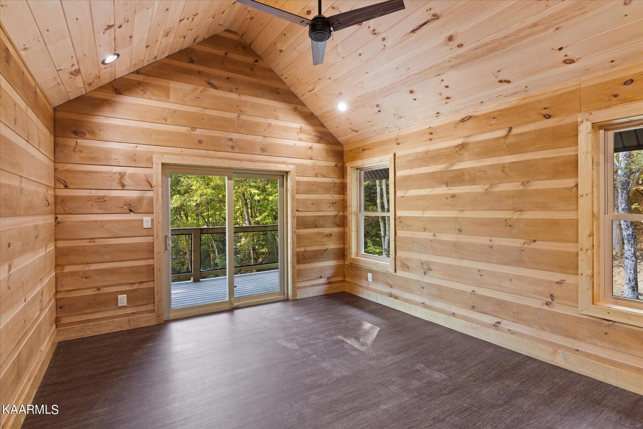 4228 Wears Valley Road, Unit 71 Sevierville, TN 37862 - Photo 26 of 28 a view of empty room with wooden floor and fan