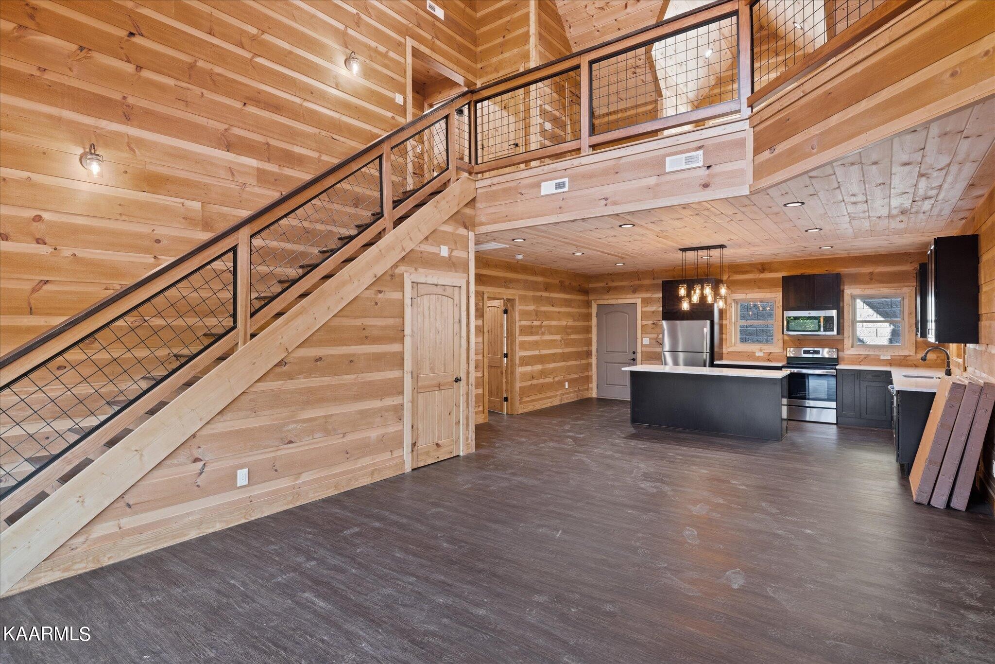 4228 Wears Valley Road, Unit 71 Sevierville, TN 37862 - Photo 5 of 28 a view of entryway and hall with wooden floor