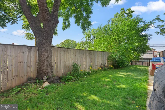 a view of a wooden fence