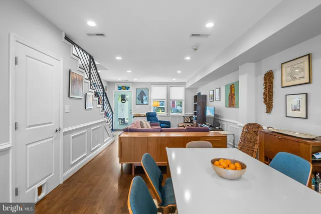 a room with furniture and a wooden floor