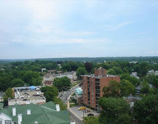 50 Glenbrook Road, Unit 15G Stamford, CT 06902 - Photo 1 of 1 an aerial view of multiple house