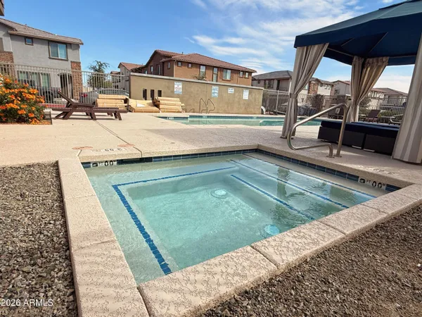 a view of a pathway with house on both side