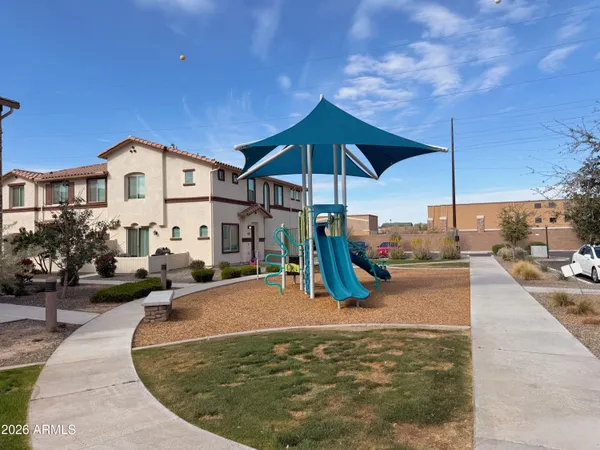a view of a park with swings
