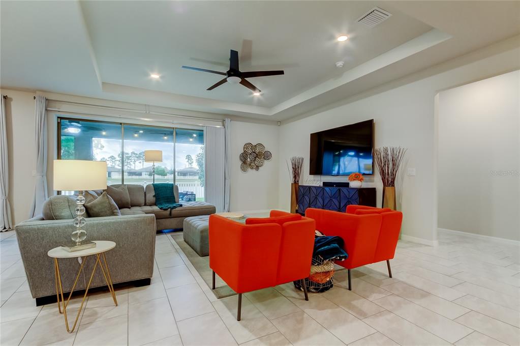 12704 Palapa Loop Spring Hill, FL 34610 - Photo 15 of 78 family room