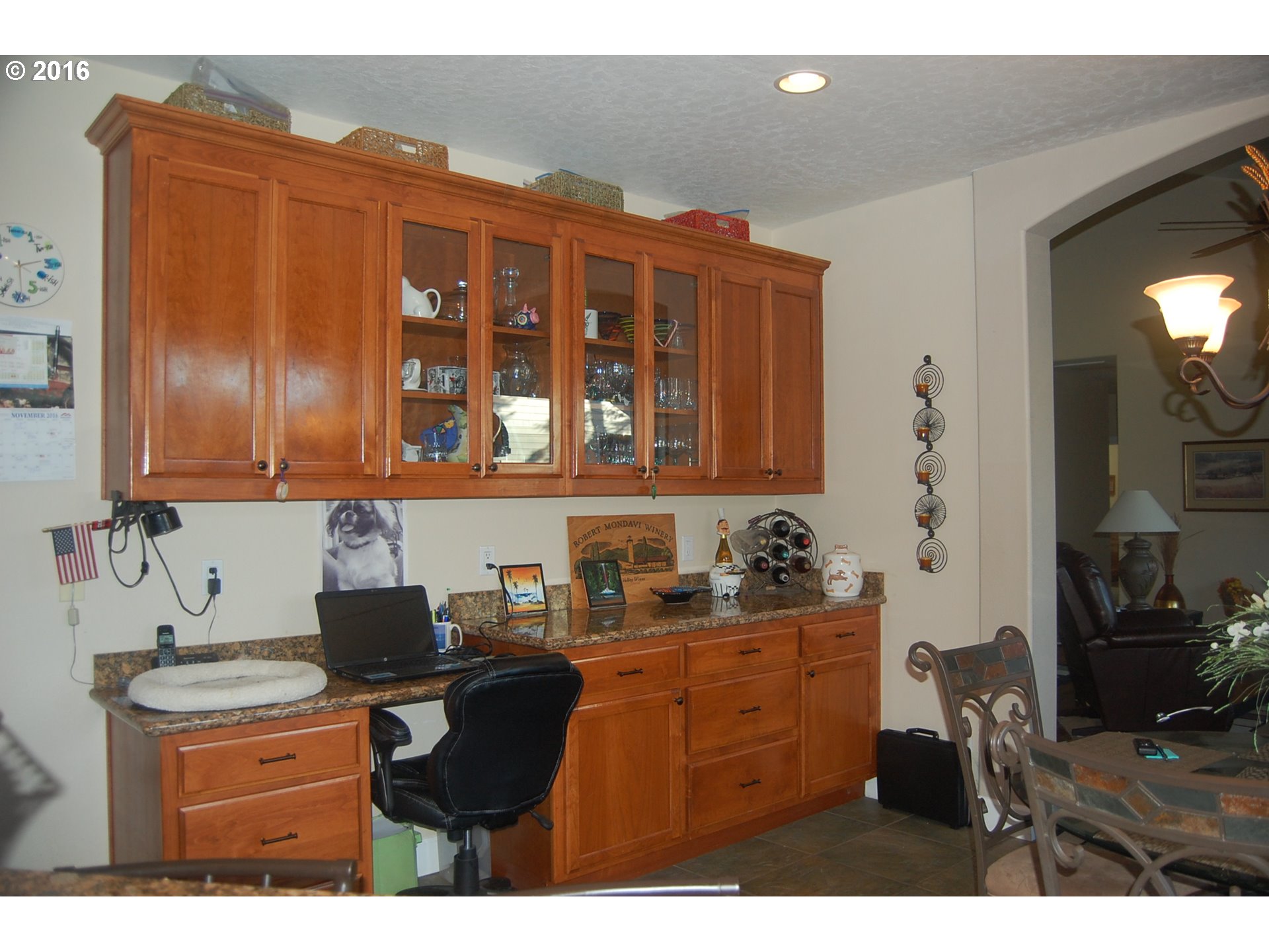 8325 Buffalo Lane Grand Ronde, OR 97347 - Photo 8 of 24 a kitchen with a sink cabinets and black appliances