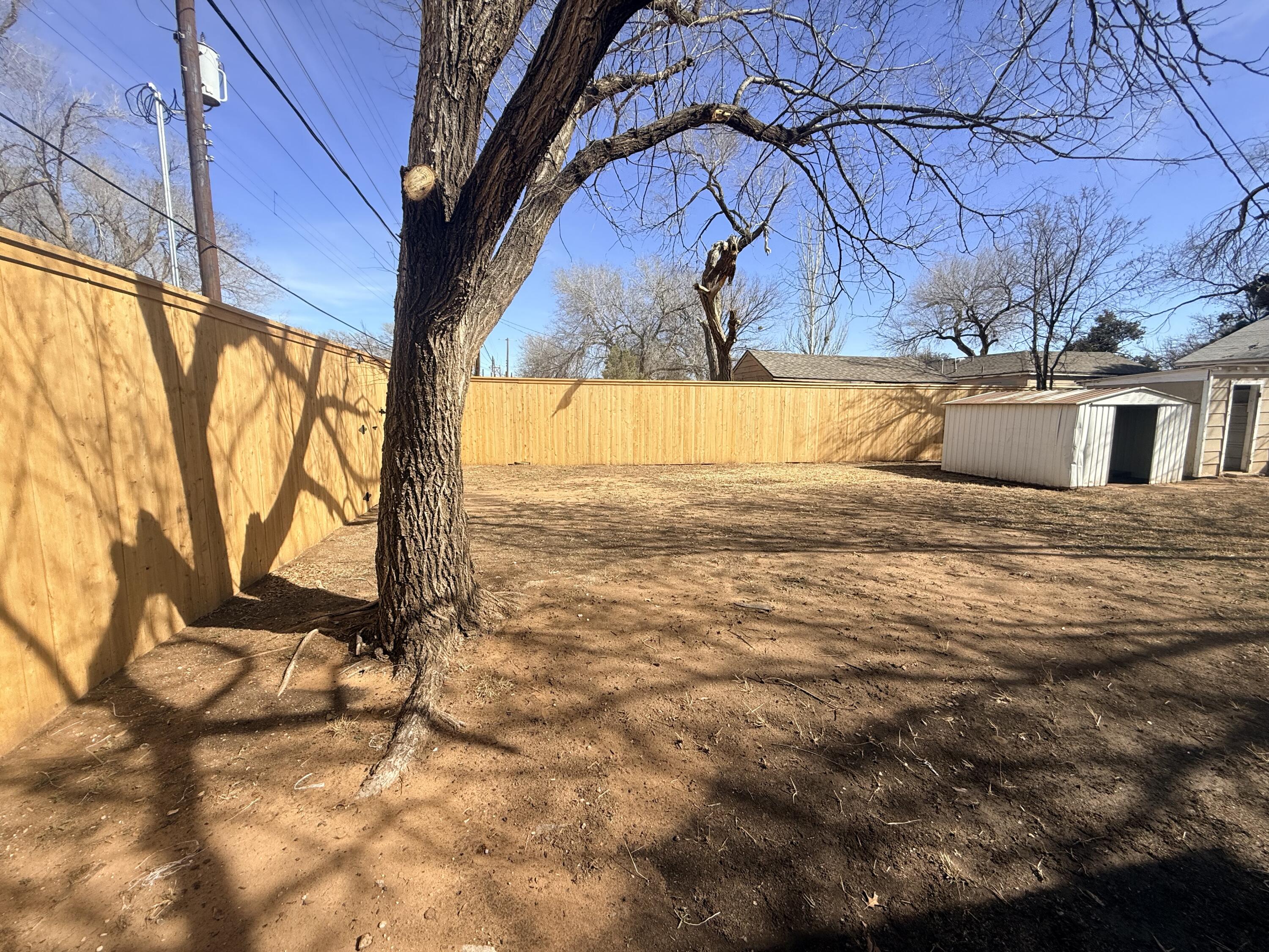 3418 25th Street Lubbock, TX 79410 - Photo 13 of 14 a view of back yard of the house