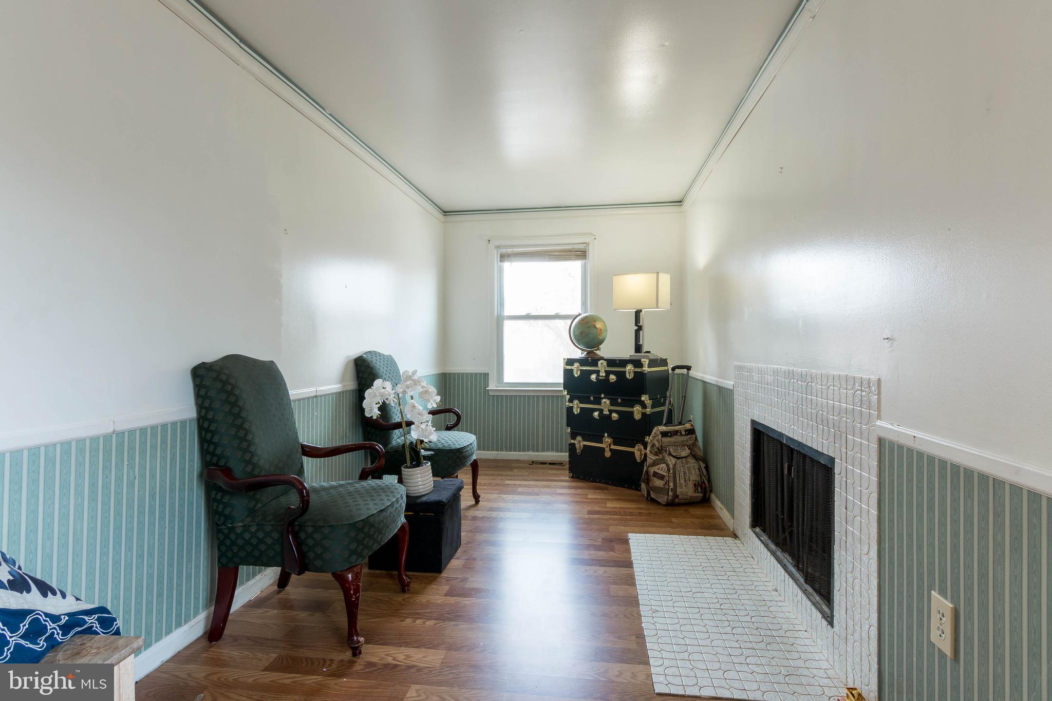 12807 North Point Lane Laurel, MD 20708 - Photo 15 of 27 Sitting area with fireplace in Owners Suite