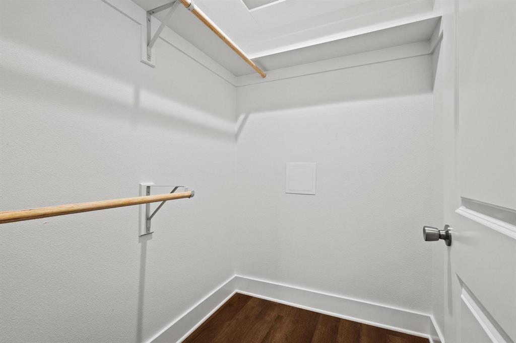 724 West Gandy Street Denison, TX 75020 - Photo 18 of 31 a view of small space with racks on the wall