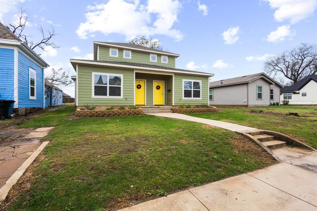 724 West Gandy Street Denison, TX 75020 - Photo 2 of 31 a front view of a house with a yard