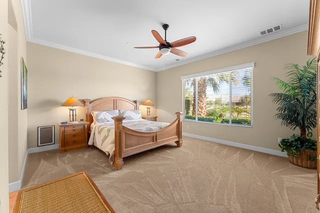 a spacious bathroom with a granite countertop tub sink and mirror