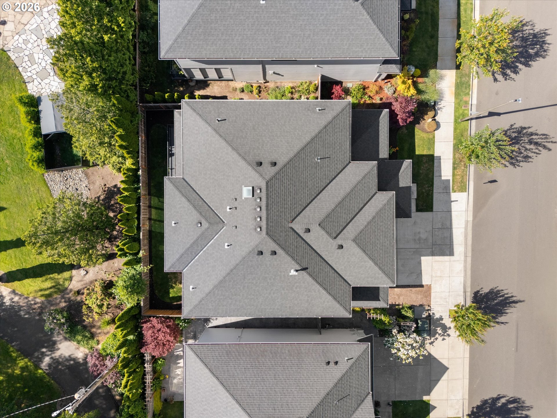 14551 Southwest 153rd Avenue Portland, OR 97224 - Photo 39 of 45 an aerial view of a house with a yard and potted plants