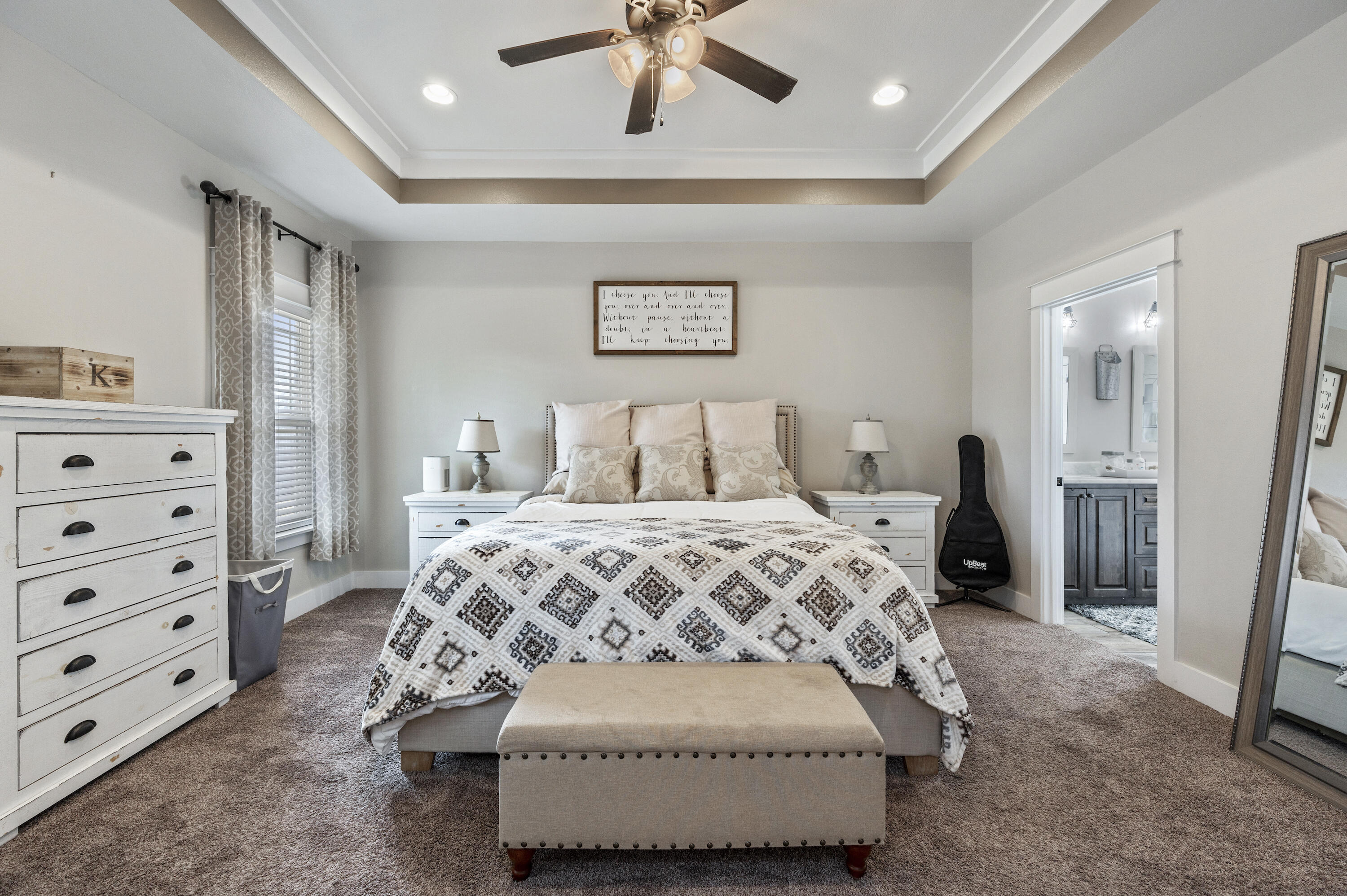 3960 Painter Branch Road Crestview, FL 32539 - Photo 15 of 46 a bedroom with a bed and a ceiling fan