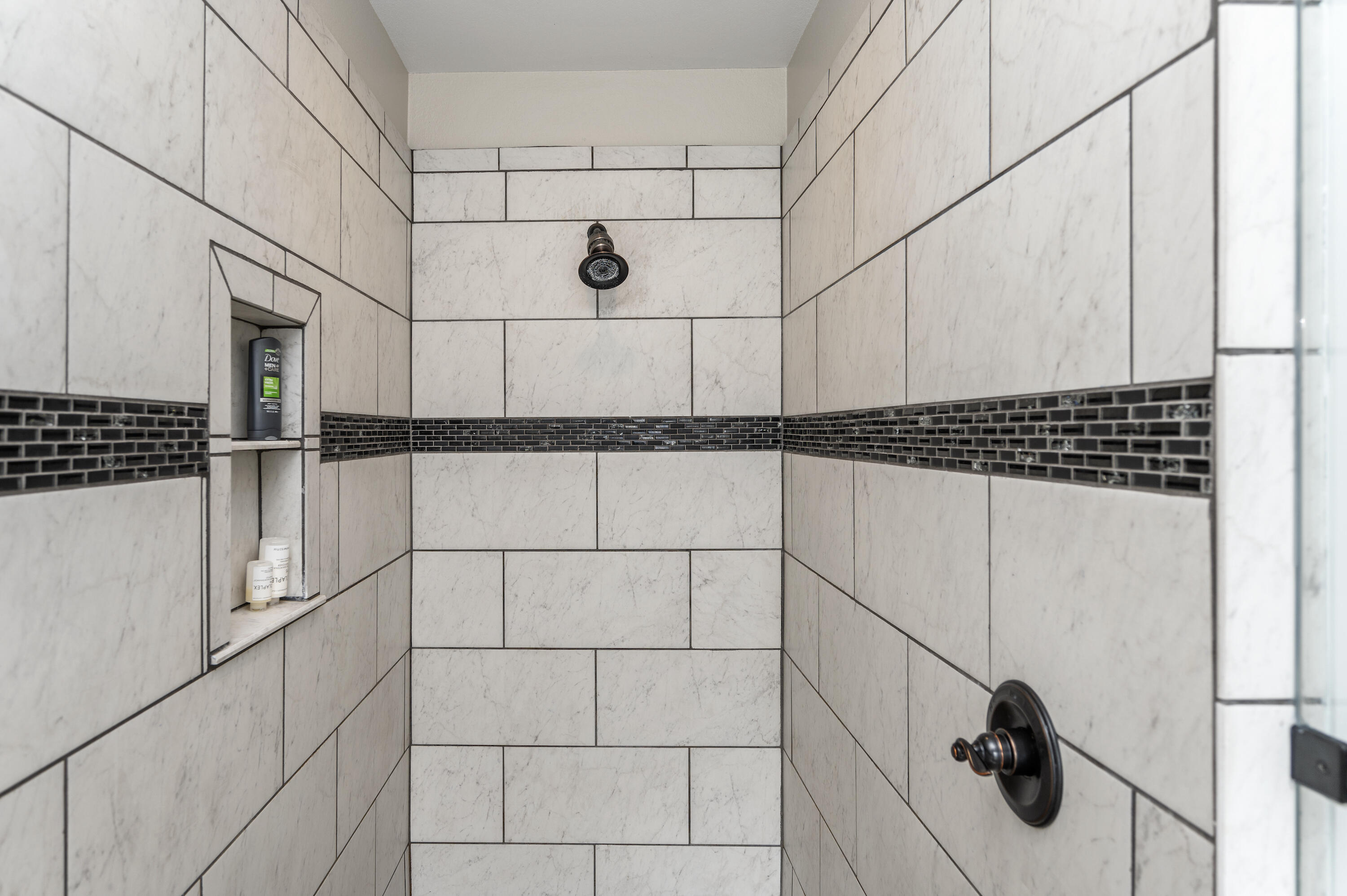 3960 Painter Branch Road Crestview, FL 32539 - Photo 23 of 46 a bathroom with a shower and a mirror