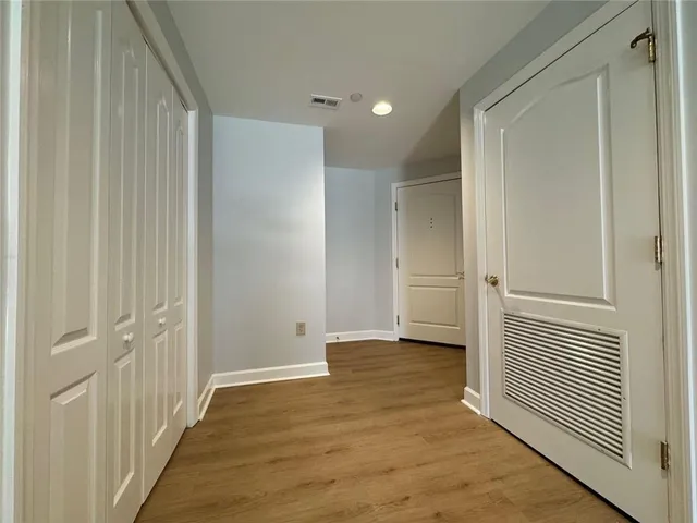 a view of a balcony with a floor to ceiling window