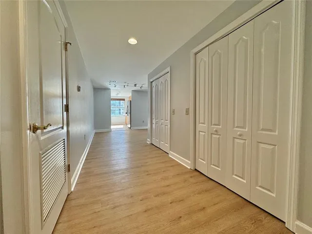 a bathroom with a toilet a sink and bathtub