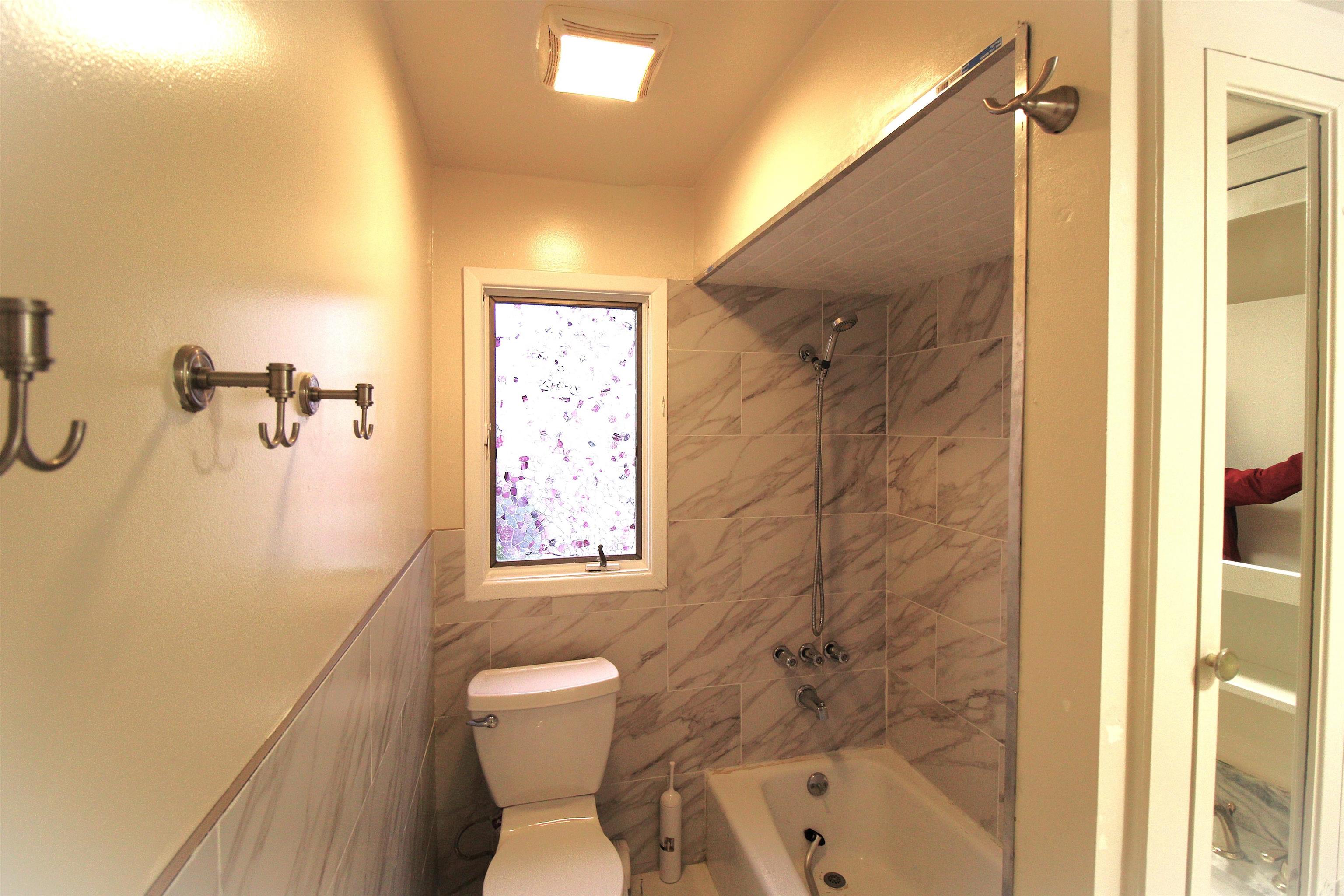 762 5th Street, Unit 1 Secaucus, NJ 07094 - Photo 11 of 27 a bathroom with a toilet and a shower
