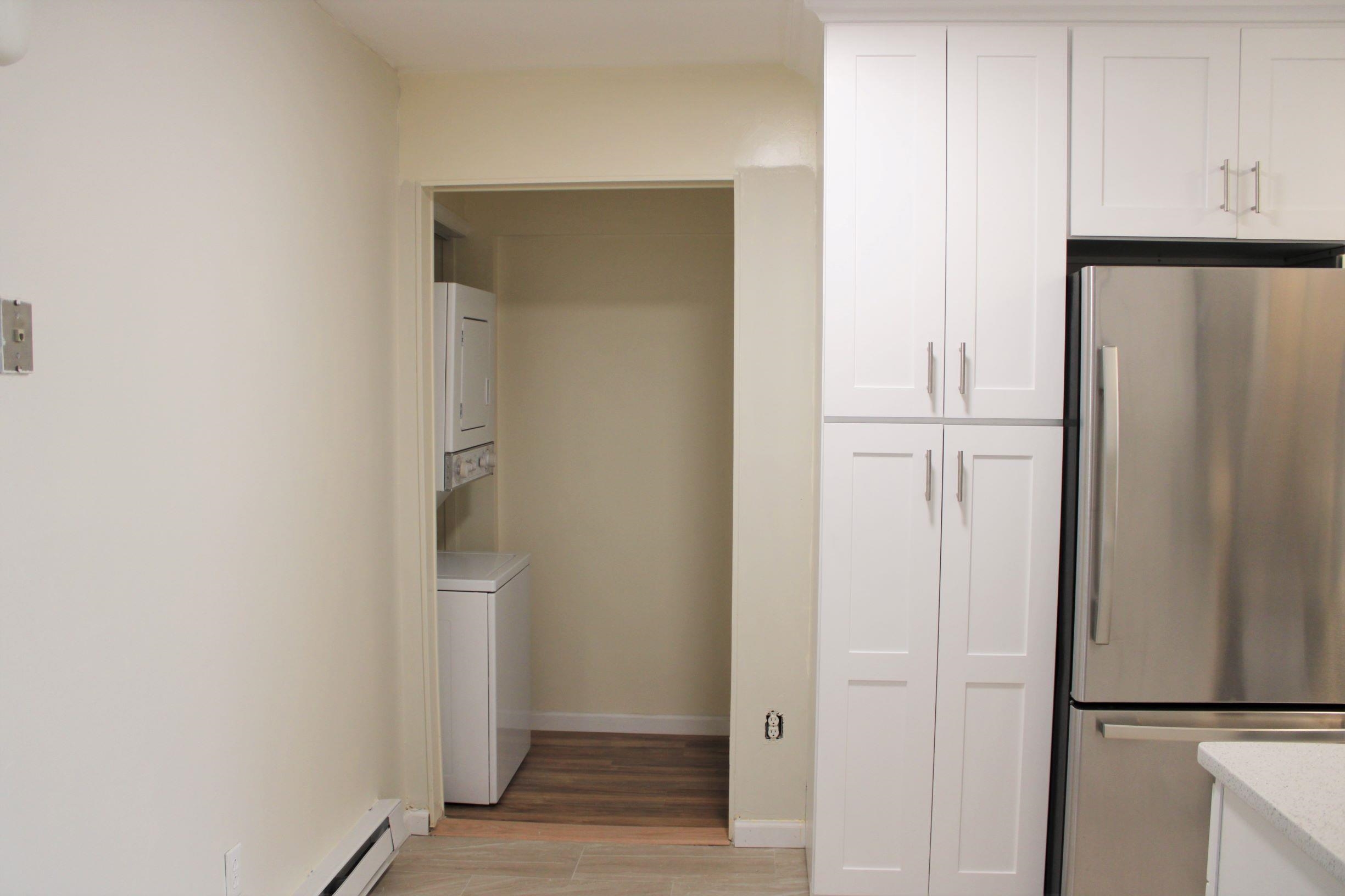 762 5th Street, Unit 1 Secaucus, NJ 07094 - Photo 9 of 27 a view of hallway with cabinets