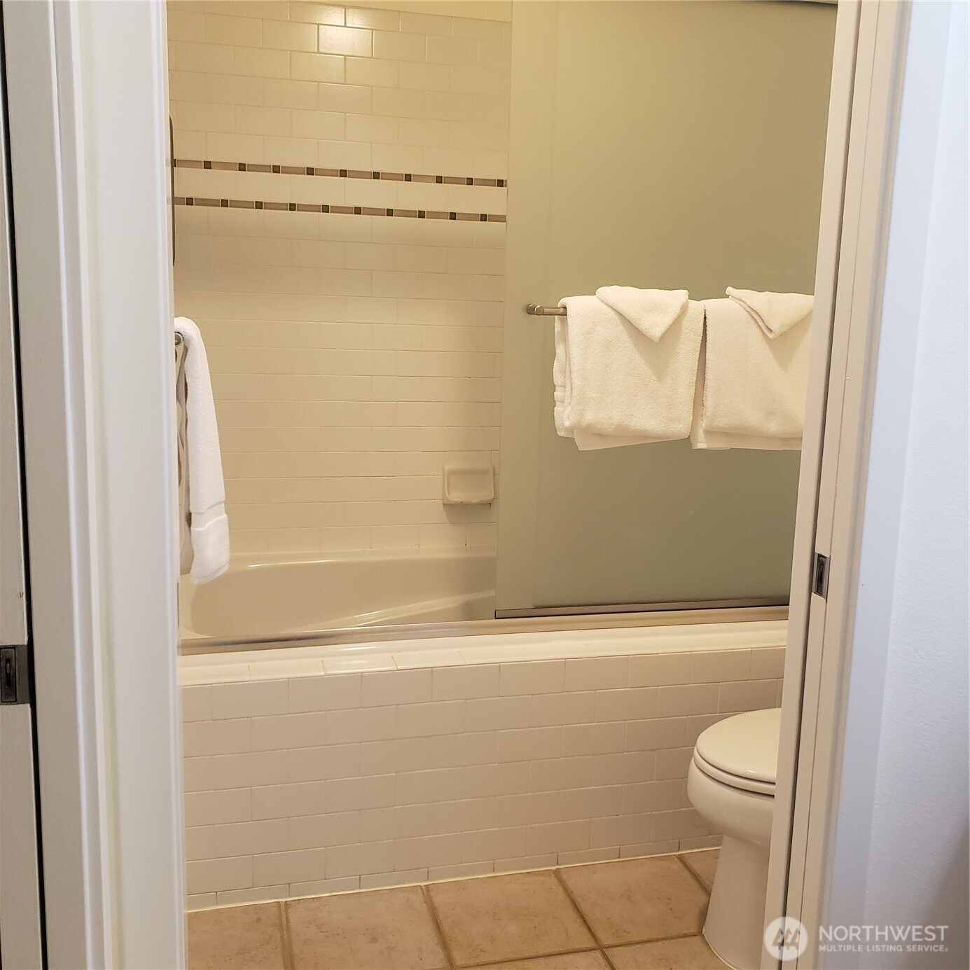 2000 Alaskan Way, Unit 342 Seattle, WA 98121 - Photo 22 of 40 a bathroom with a shower and a toilet