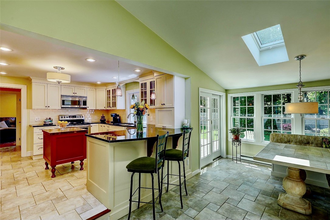 5 Surrey Road Barrington, RI 02806 - Photo 3 of 31 Renovated in 2013, the kitchen and family room/sitting area greet you as you enter 5 Surrey Drive.