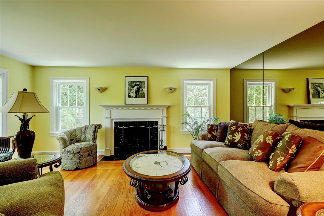 5 Surrey Road Barrington, RI 02806 - Photo 9 of 31 Fireplaced living room lends itself to endless arrangements.