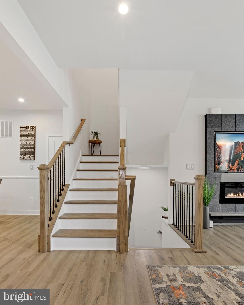 2008 Serviceberry Road Dumfries, VA 22026 - Photo 11 of 50 EXTRA WIDE STAIRCASES WITH WOOD FLOORING!
