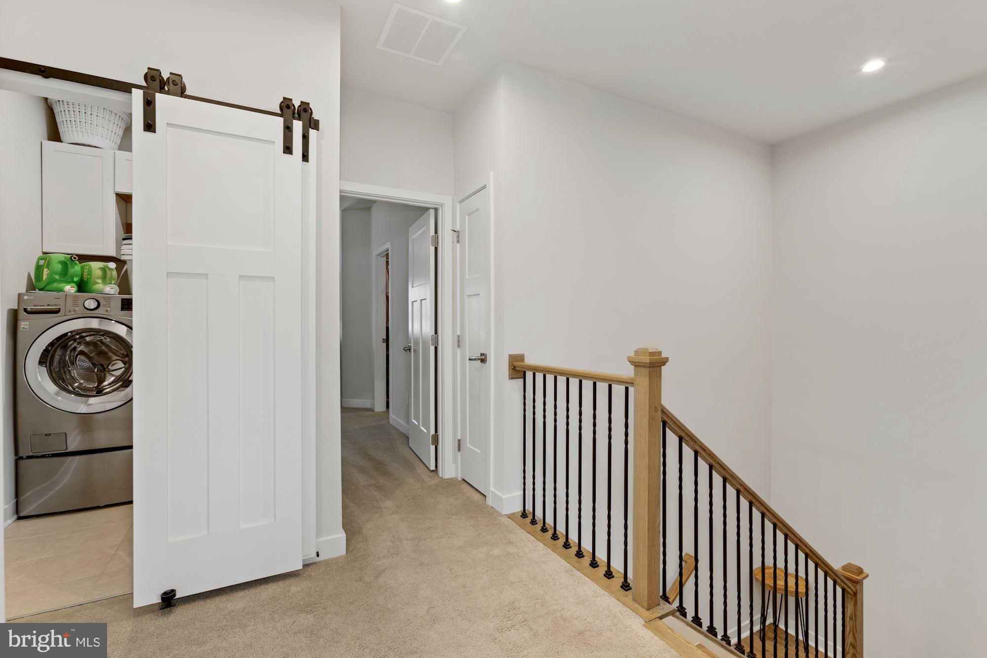 2008 Serviceberry Road Dumfries, VA 22026 - Photo 25 of 50 LARGE UPPER LEVEL LANDING W/BARN DOORS TO LAUNDRY