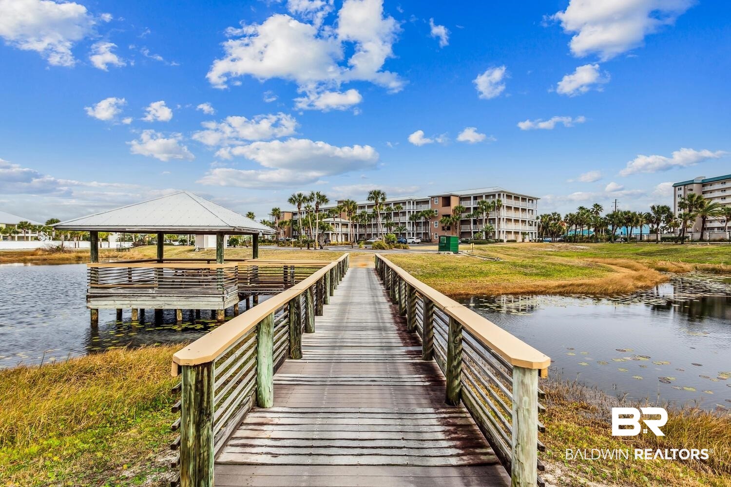 13551 Johnson Beach Road, Unit 112E Pensacola, FL 32507 - Photo 33 of 42 Dock area featuring a water view and a gazebo