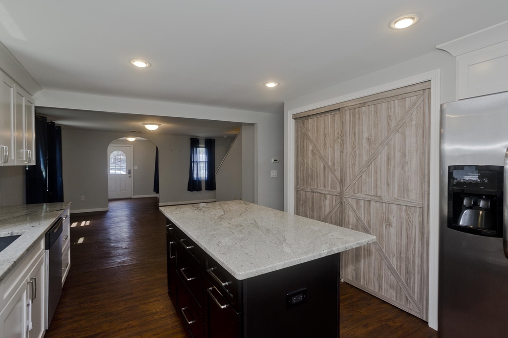 50 Cottage Road Enfield, CT 06082 - Photo 15 of 40 a kitchen with counter top and wooden floor