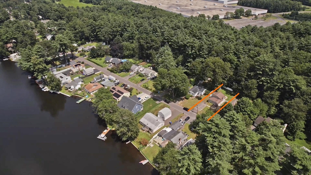 50 Cottage Road Enfield, CT 06082 - Photo 3 of 40 an aerial view of a house with a yard and lake view