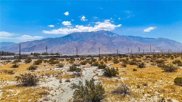 a view of a ocean with boats