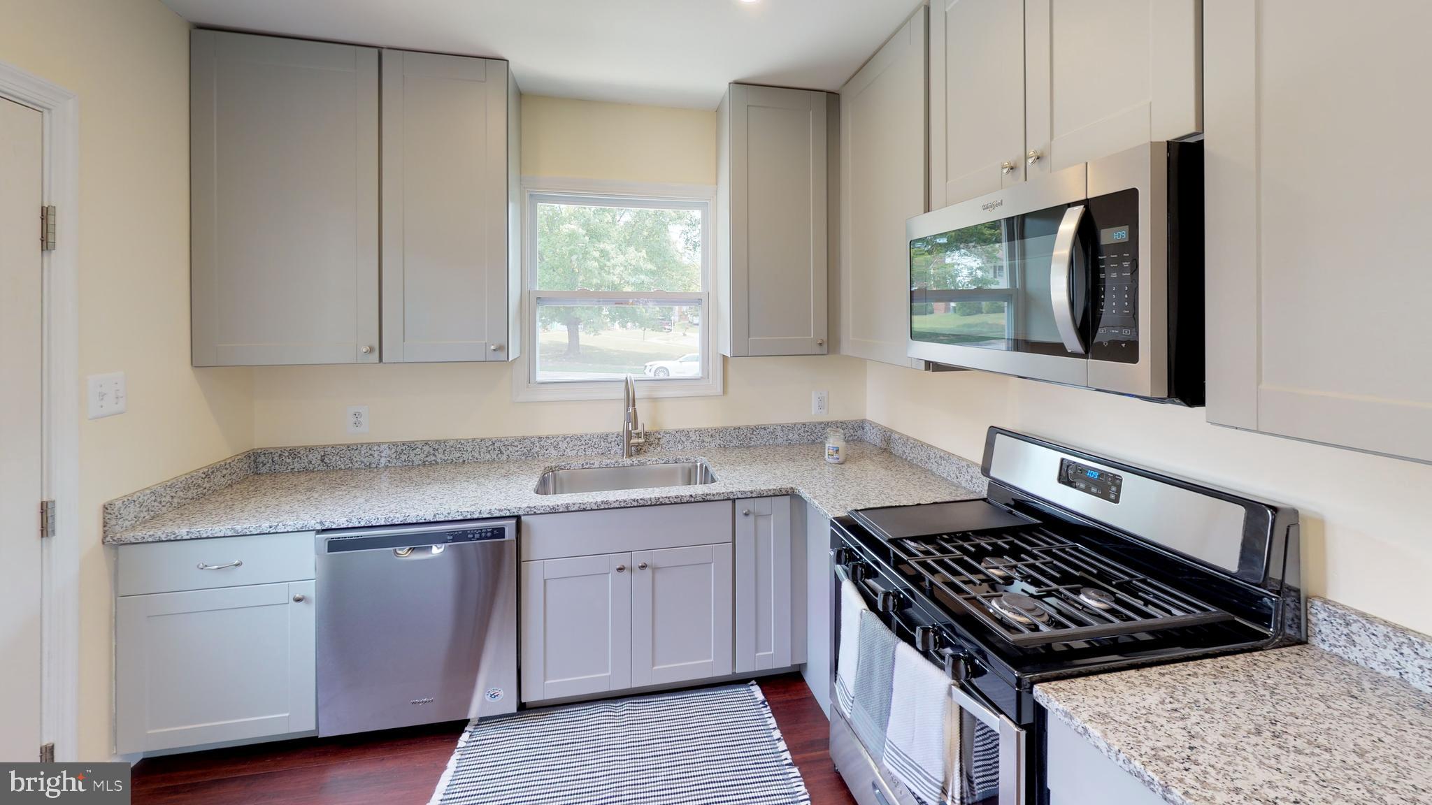 212 Timber Grove Road Reisterstown, MD 21136 - Photo 8 of 21 Granite counters, gas cooking range