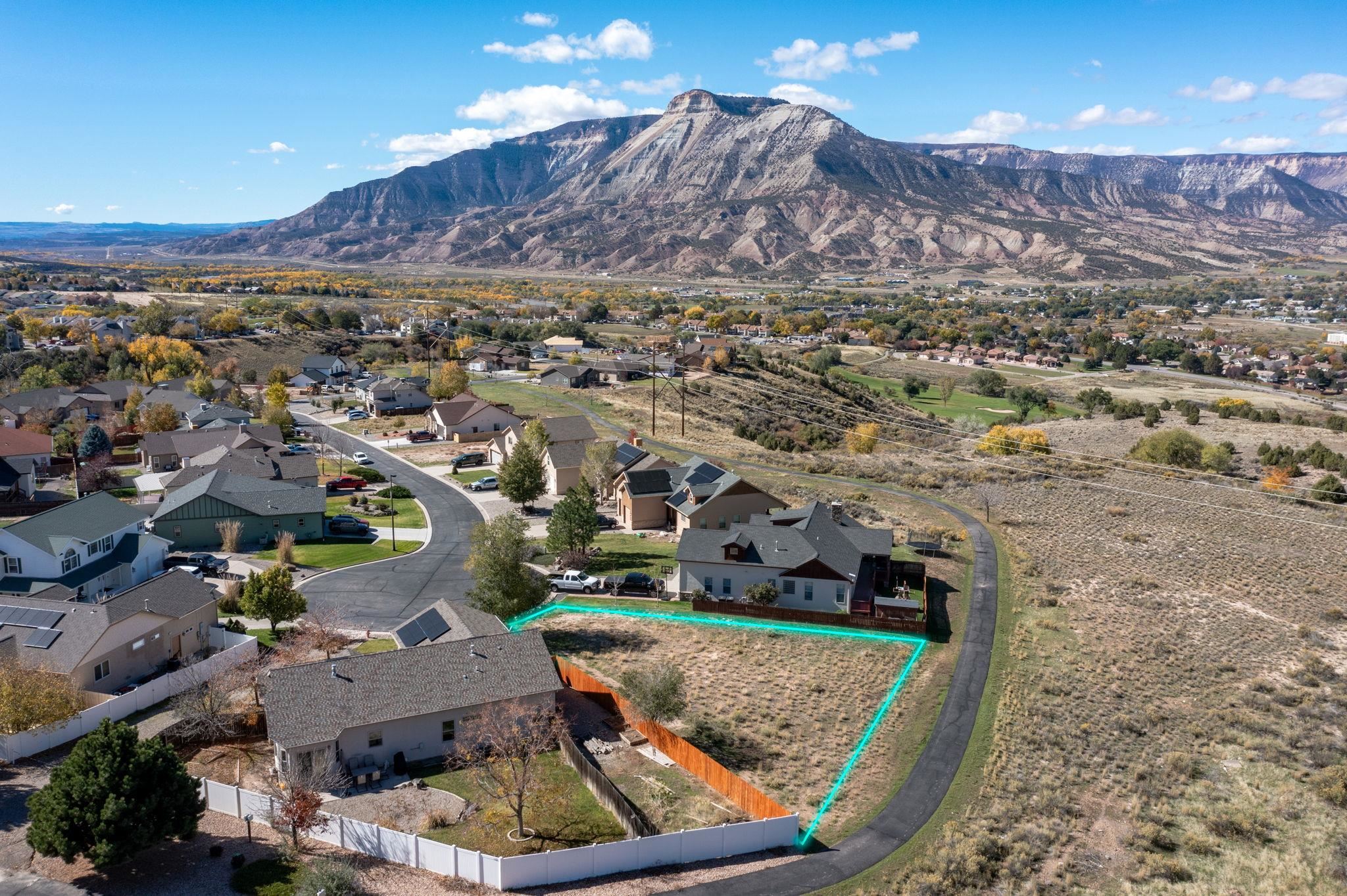 137 Talon Trace Parachute, CO 81635 - Photo 1 of 6 an aerial view of a house with a yard
