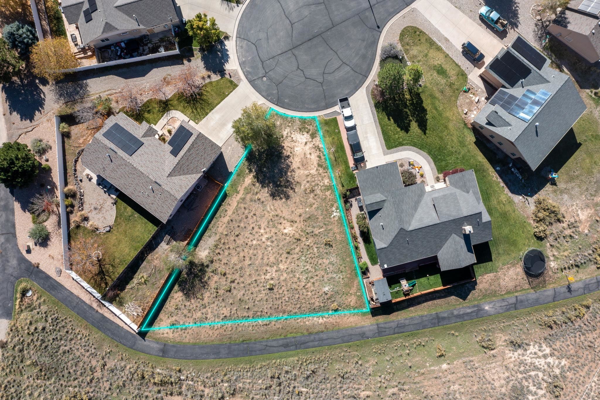 137 Talon Trace Parachute, CO 81635 - Photo 3 of 6 an aerial view of a house with a swimming pool