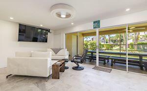 1605 Highway 1, Unit M2107 Jupiter, FL 33477 - Photo 5 of 22 living room & patio view