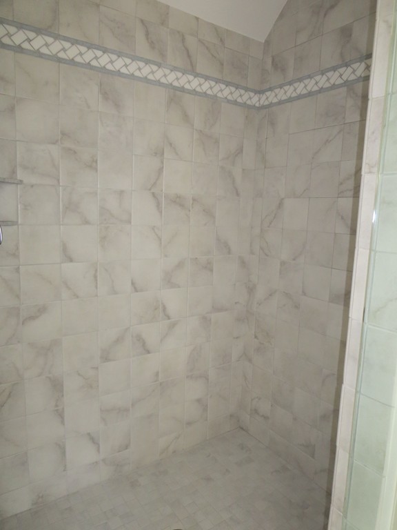 50 Wintergreen Road Mashpee, MA 02649 - Photo 23 of 30 a bathroom with a shower