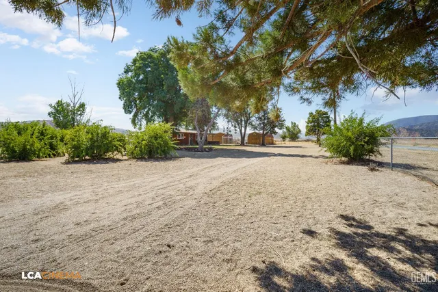 a house with trees in front of it