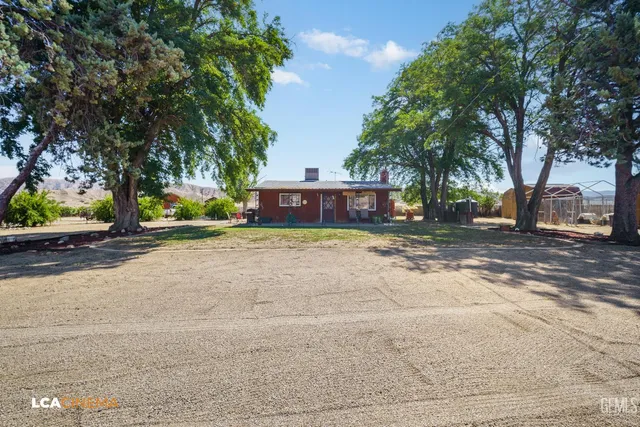 a view of a street with trees